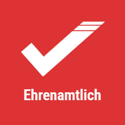 Weißer Haken auf rotem Hintergrund mit dem Text "Ehrenamtlich" darunter.