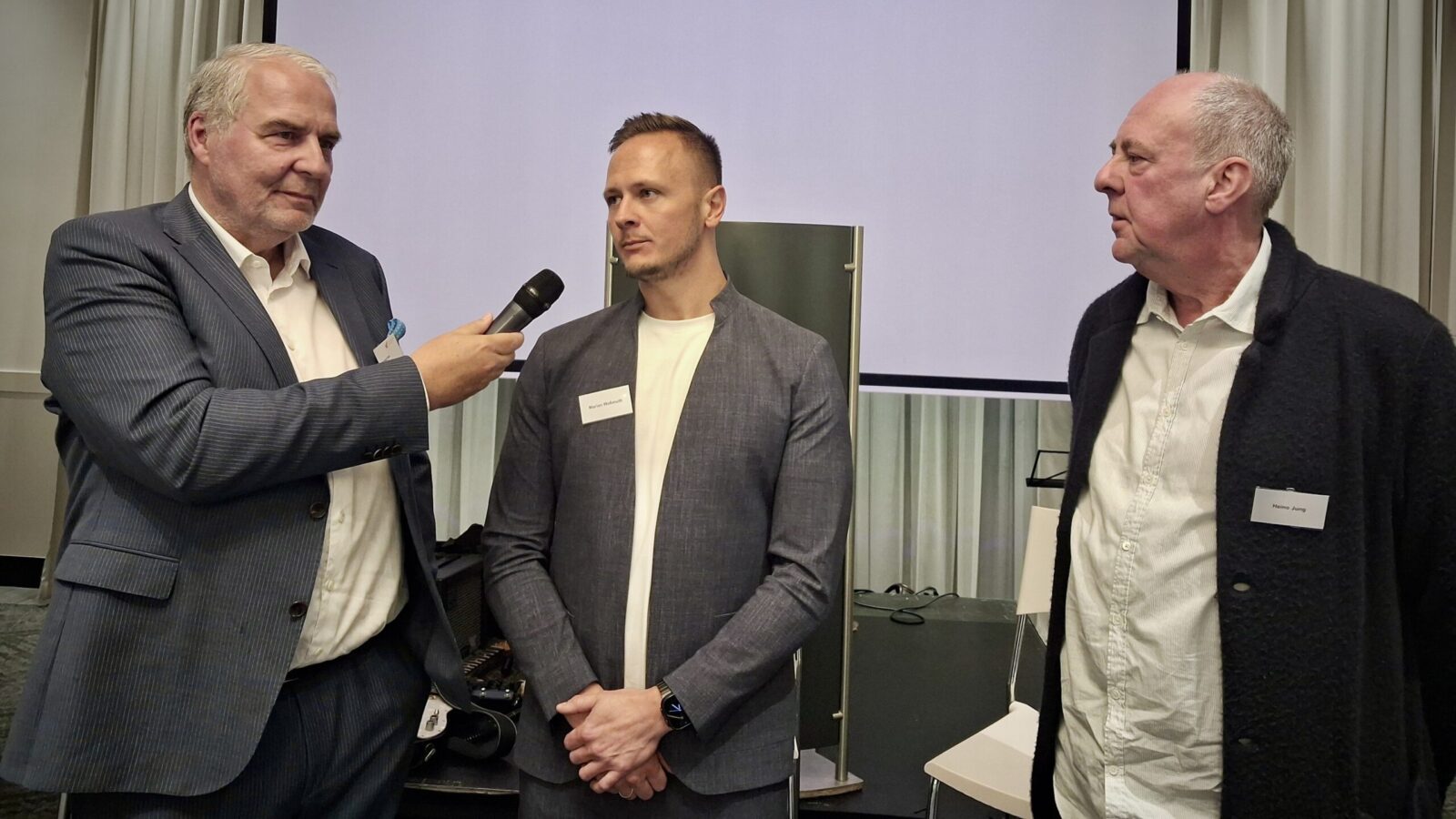 Reinhard Stiehl (Wirtschaftssenior, Moderator), Marian Waßmuth und Heino Jung (YGE)
